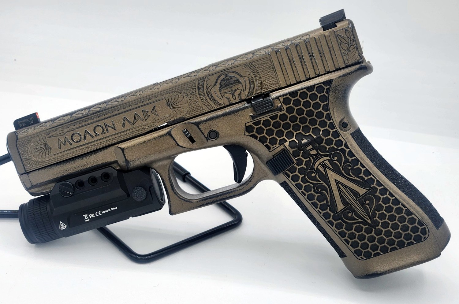 Spartan themed custom pistol engraving
